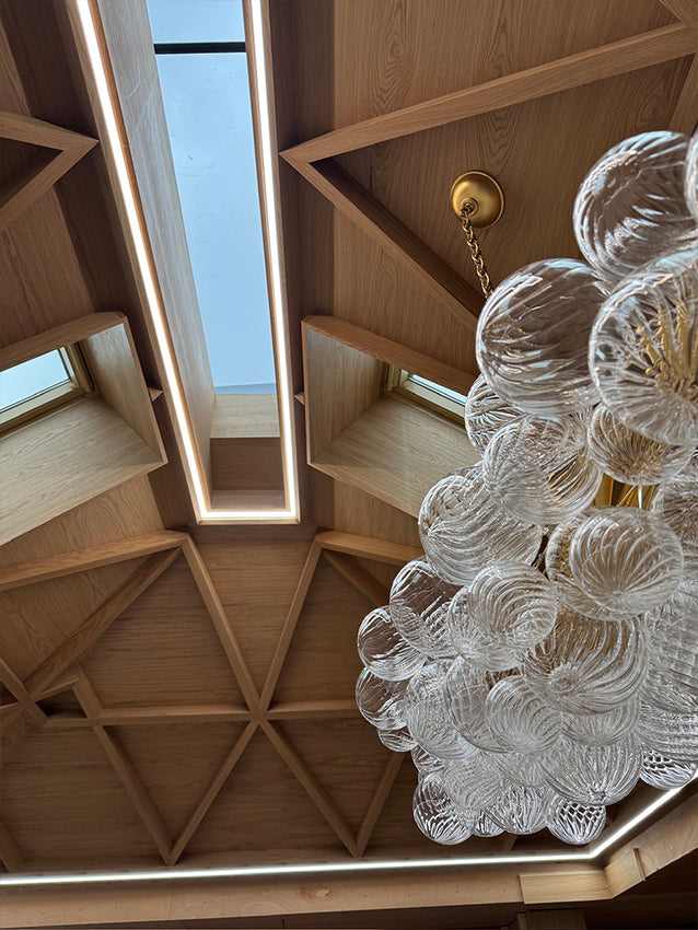 Maidstone - the geometric oak ceiling with integrated LED lights that can be adjusted from daylight to warm white with an easy-to-use app and control panel