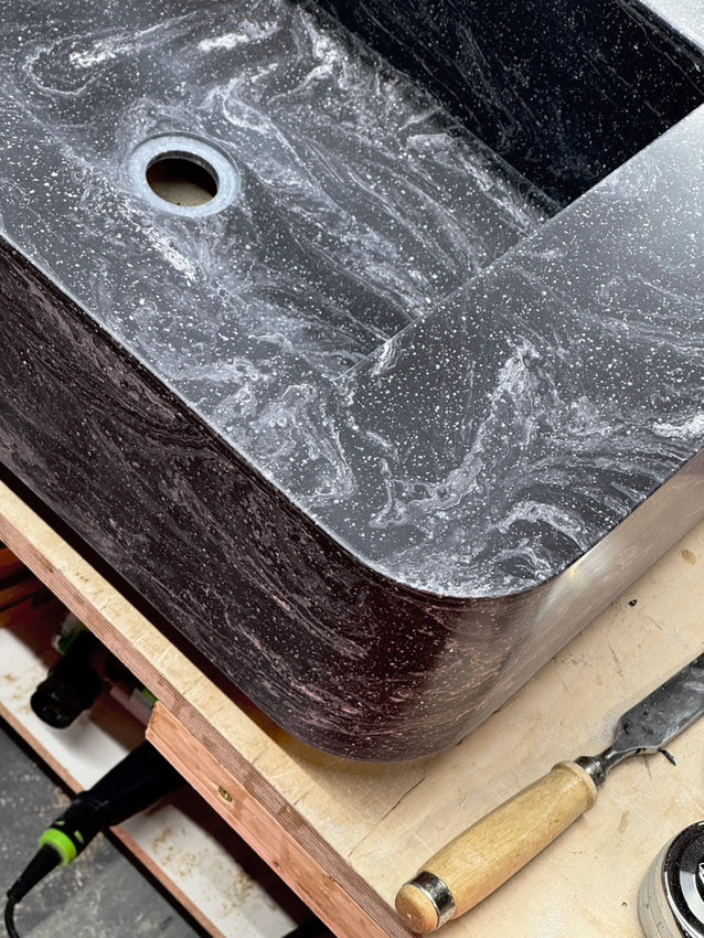 Workshop - bespoke Corian basin being polished ready for delivery