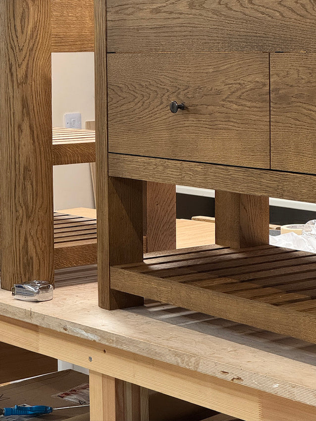Workshop - vanity units: bespoke aged oak stain, slats are on and drawers are in